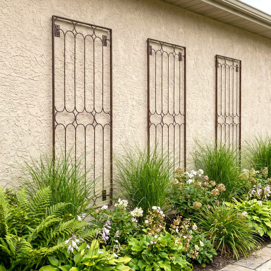 H Potter Carlisle Wall Trellis - Set of 3 on a stucco house above plants