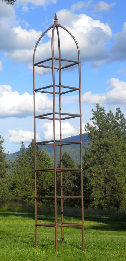 H Potter chic farming obelisk trellis installed in garden lawn