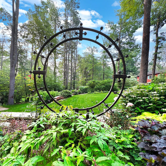 H Potter Garden Trellis Heirloom Round Metal Yard Art in garden landscape setting