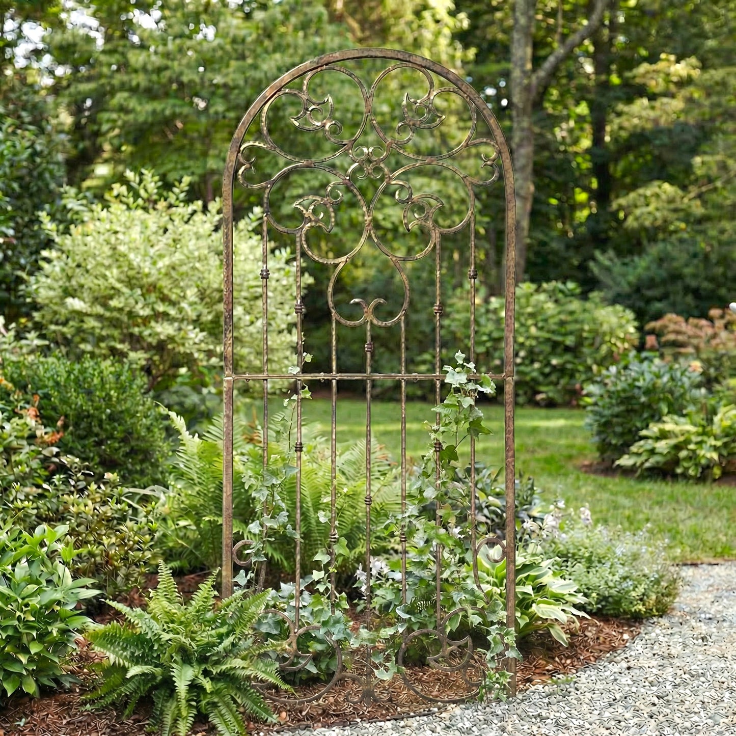 H potter legacy metal garden trellis with arch in a lush garden setting