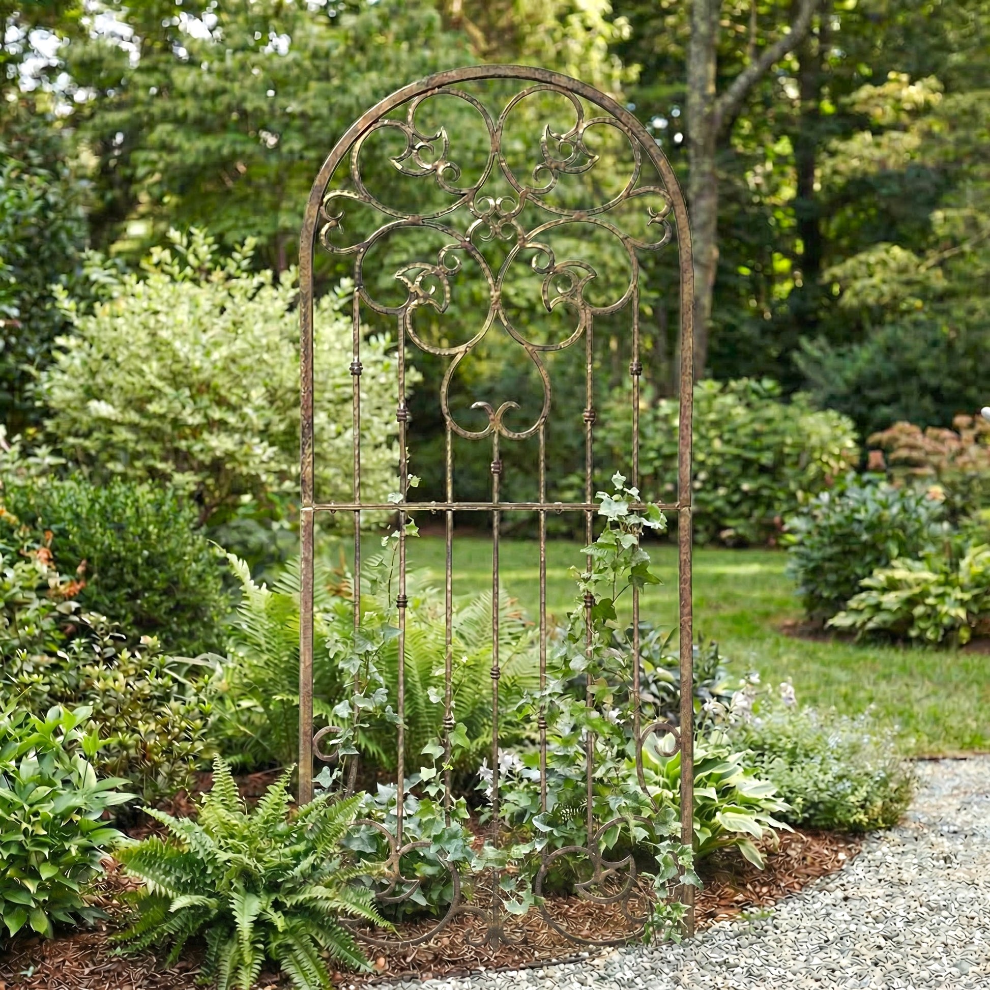 H potter legacy metal garden trellis with arch in a lush garden setting