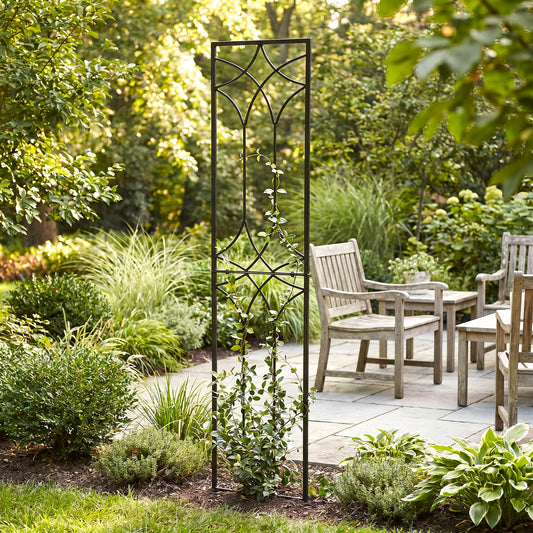 H Potter tall geometric garden trellis in a yard with vines and green plants