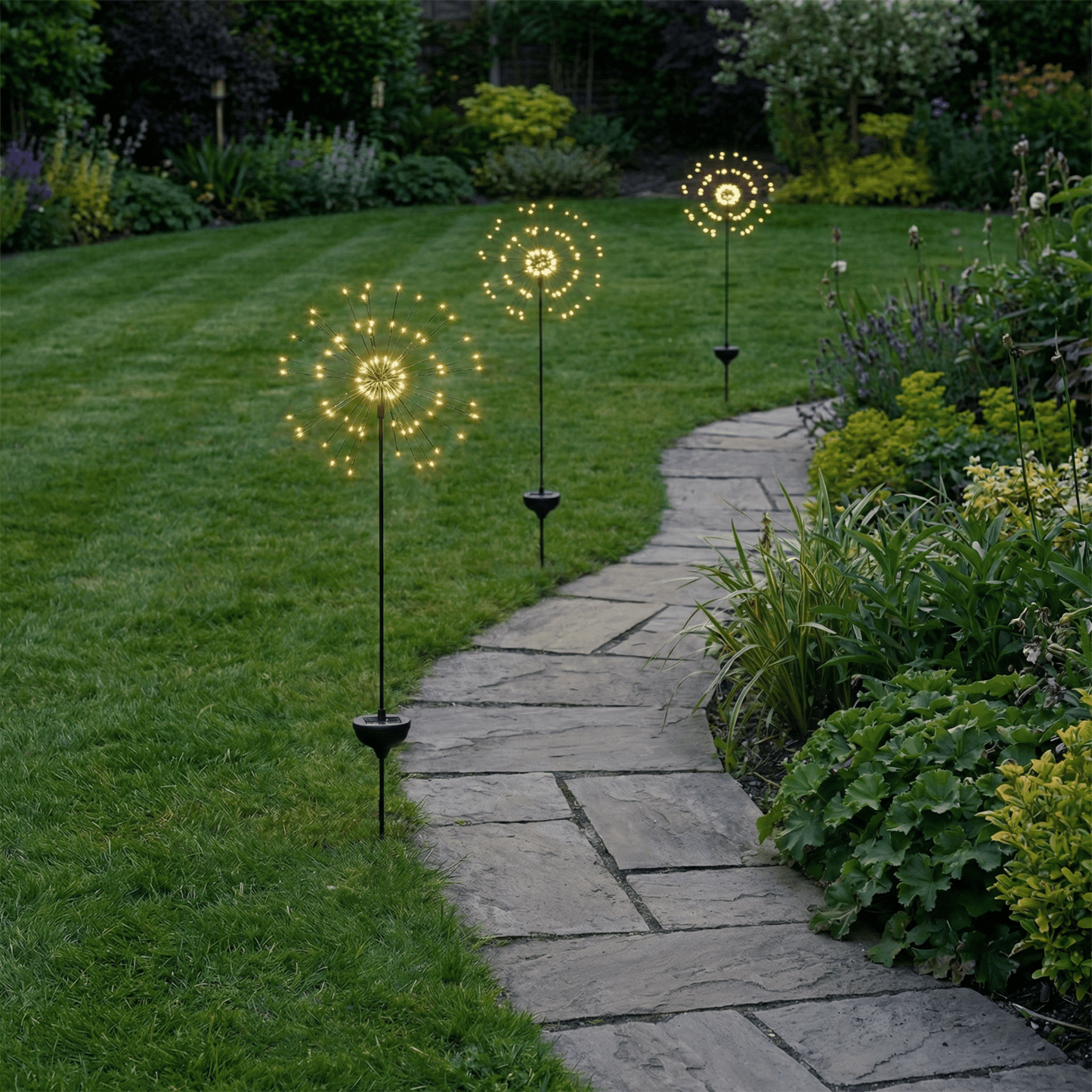h potter solar sparkle stake lights set of 3 on a garden path